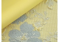 Tissu broché jaune à fleurs bleu