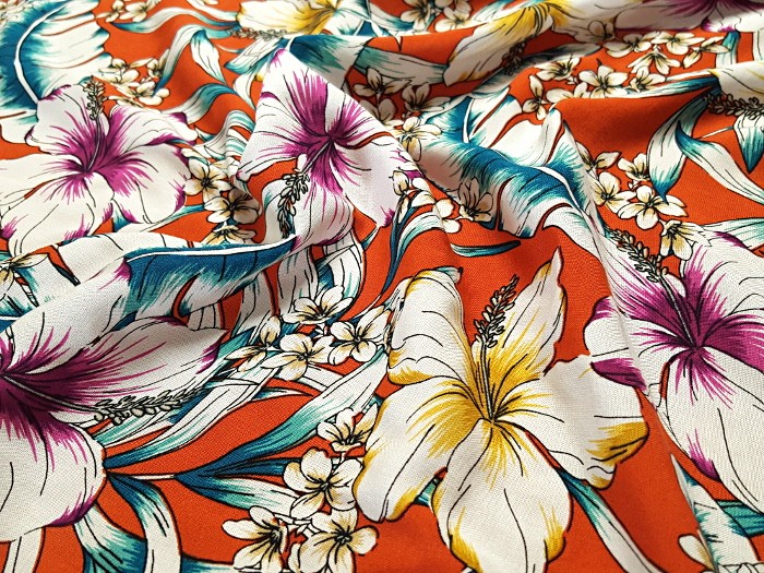 Tissu viscose Chally imprimée hibiscus brique