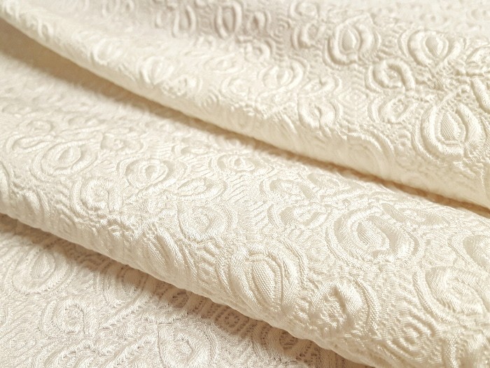 Tissu broché de laine et soie blanc cassé