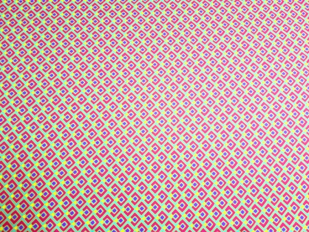 Tissu satin de coton imprimé géométrique rose
