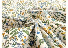 Tissu imprimé fleurs jaunes et bleues