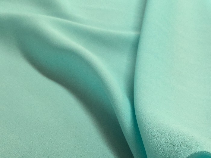 Tissu crêpe vert d'eau
