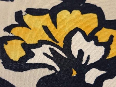 Tissu jersey imprimé fleurs bicolores