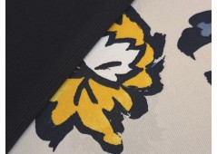 Tissu jersey imprimé fleurs bicolores