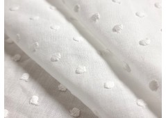 Tissu batiste de coton brodée plumetis