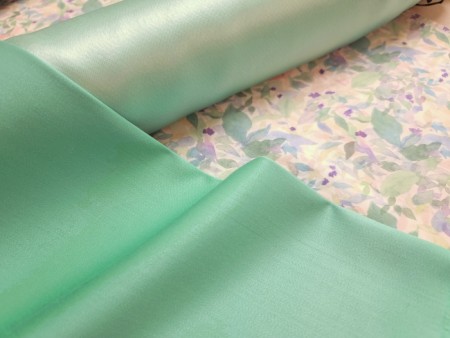 Tissu percale imprimée aquarelle de feuilles pastel